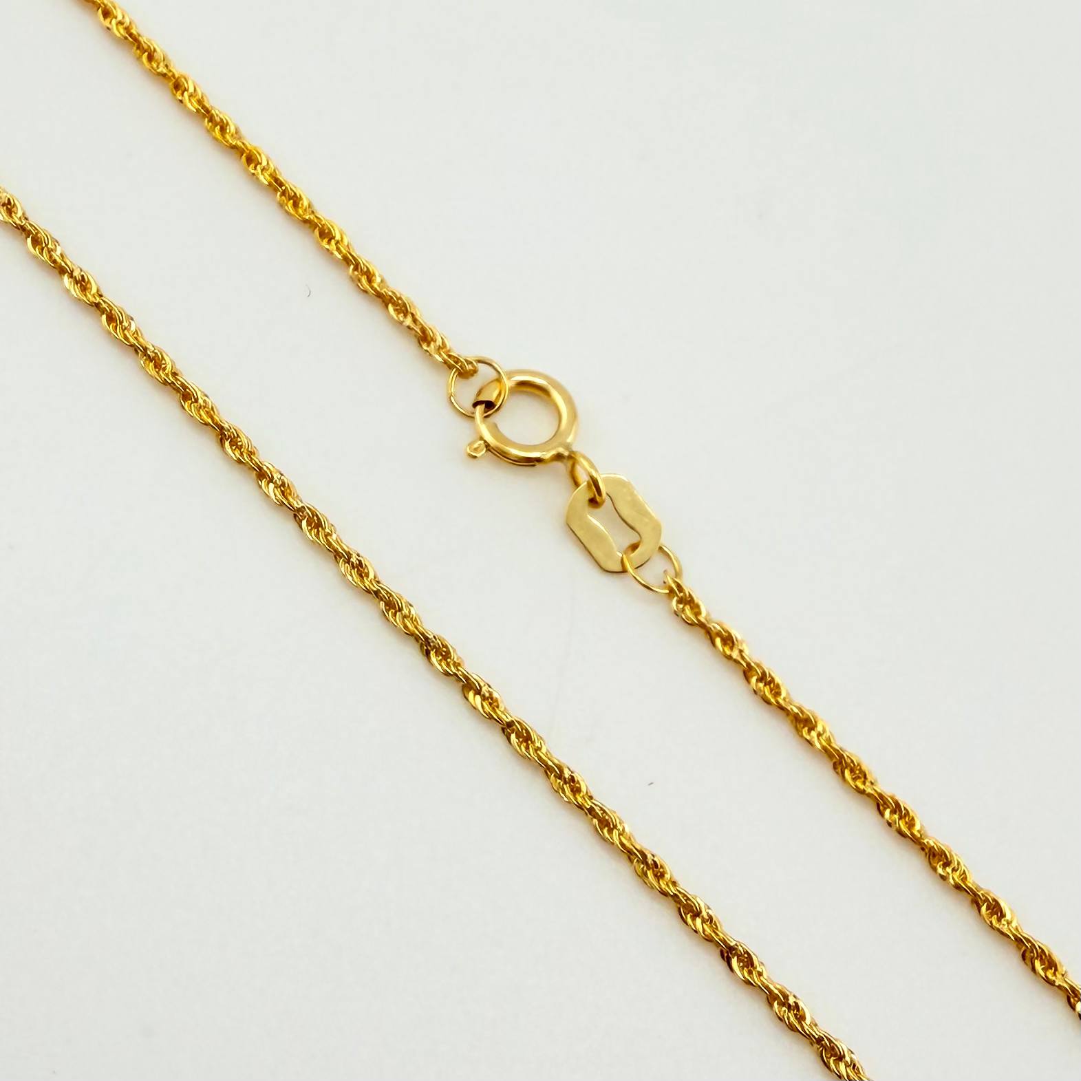 Cadena Lazo 1.1gr / 23 1/2 in / 1.2mm Oro Amarillo +3 18K