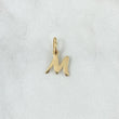 Dije Letra M Cursiva 0.5gr / 3/4 in / Oro Amarillo 18K