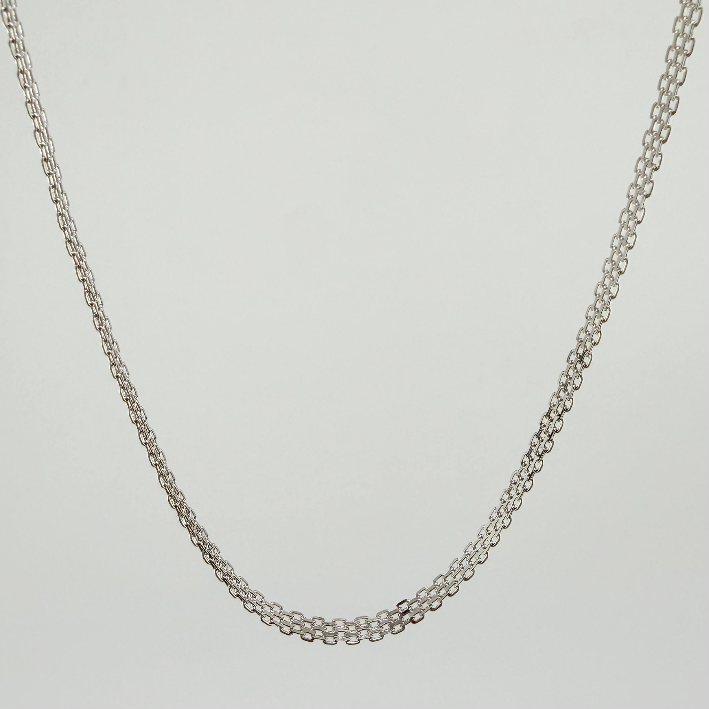 Cadena China 9.1gr / 23 1/2 in / 3.3mm Oro Blanco +1 18K ©