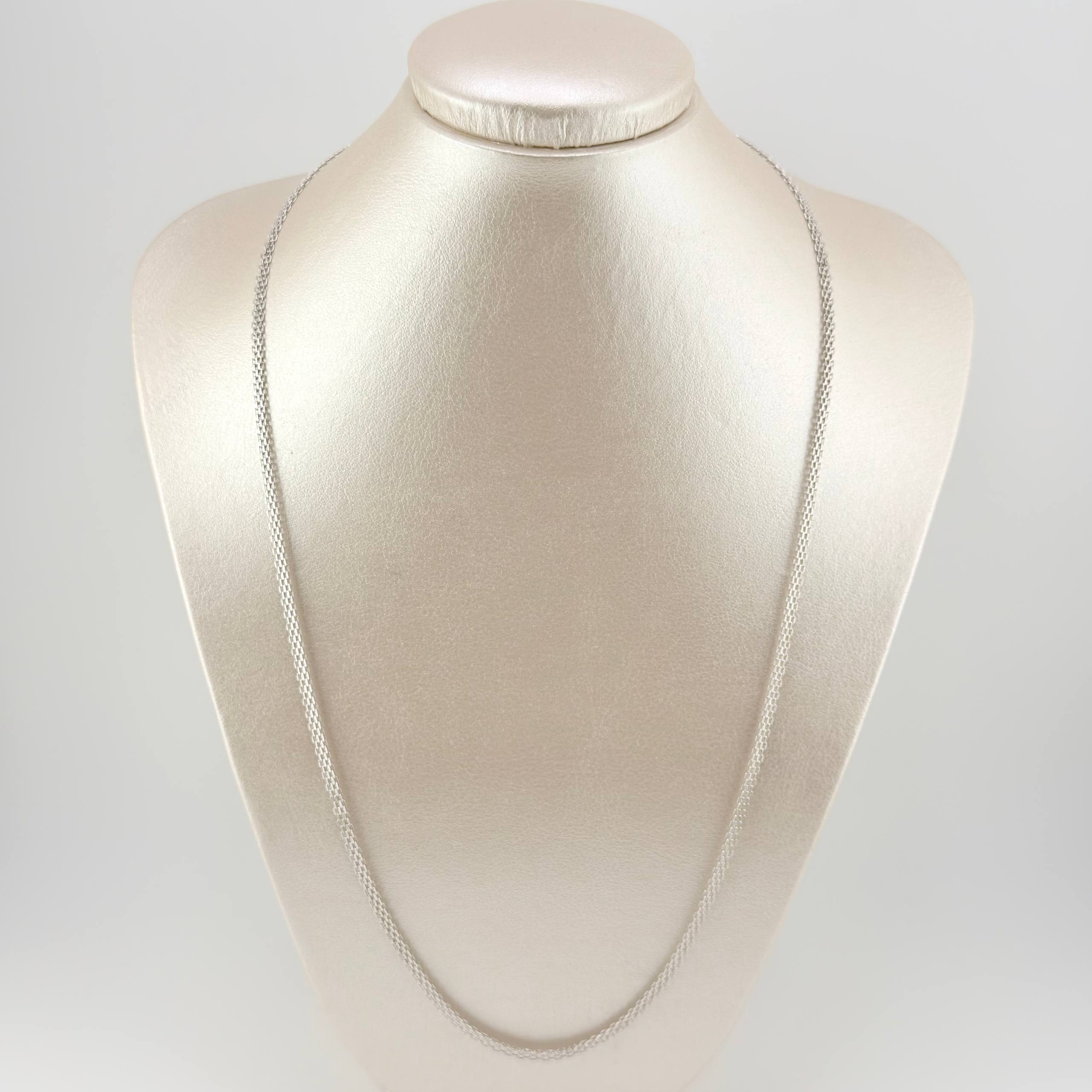 Cadena China 9.1gr / 23 1/2 in / 3.3mm Oro Blanco +1 18K ©