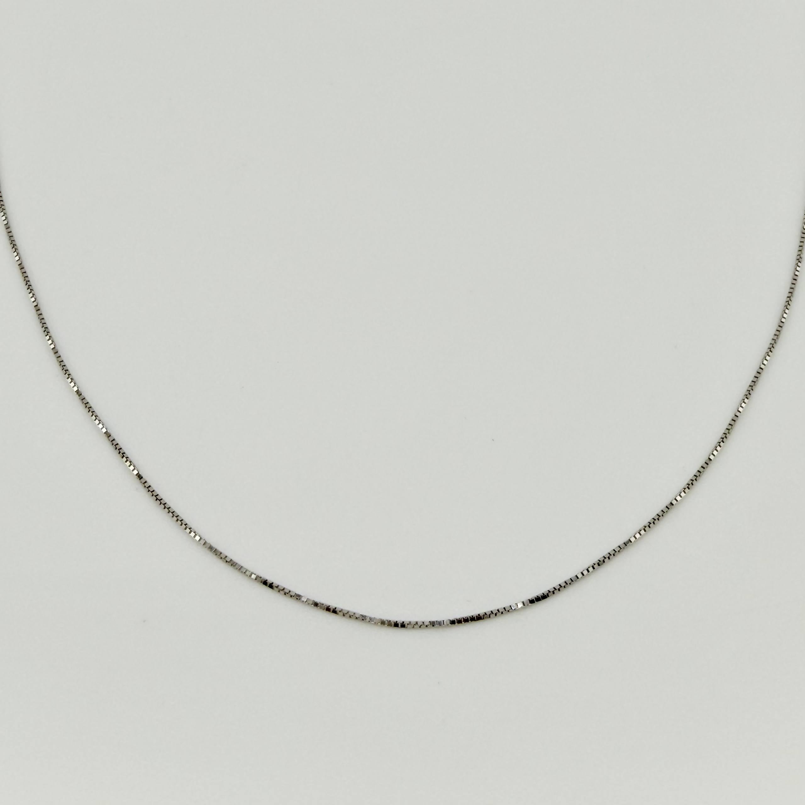 Cadena Veneciana 0.9gr / 15 3/4 in / 0.6mm Oro Blanco +3 18K ©