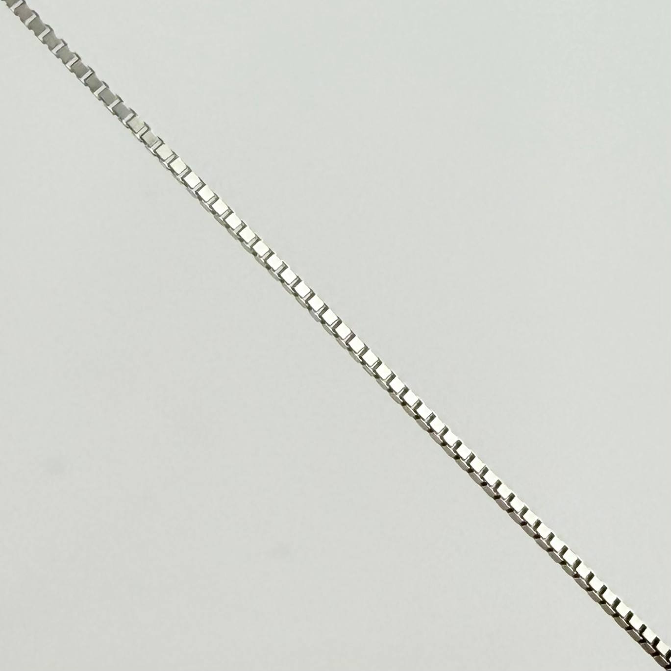 Cadena Veneciana 0.9gr / 15 3/4 in / 0.6mm Oro Blanco +3 18K ©