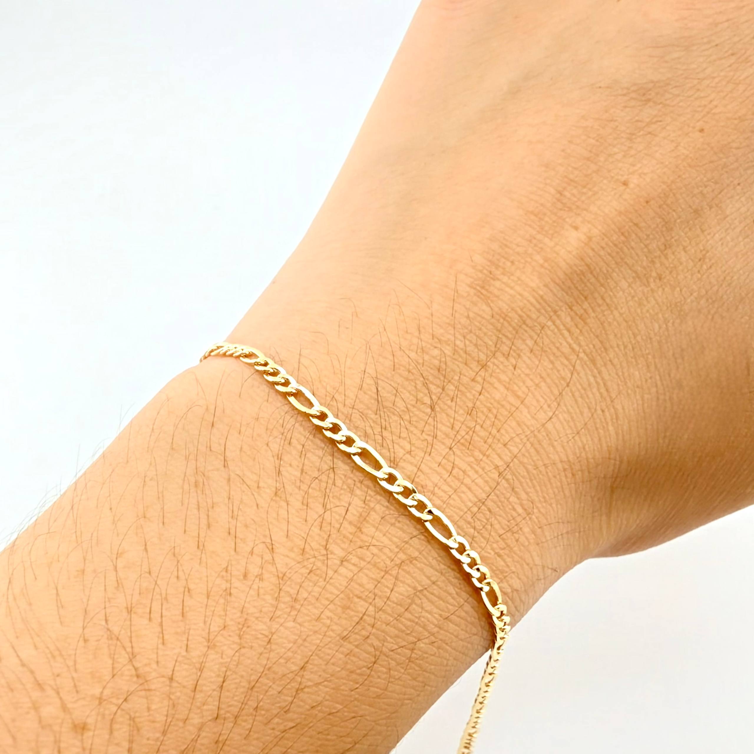 Pulso Figaro 1.45gr / 7 1/2 in / 2.4mm Oro Amarillo +1 18K ©