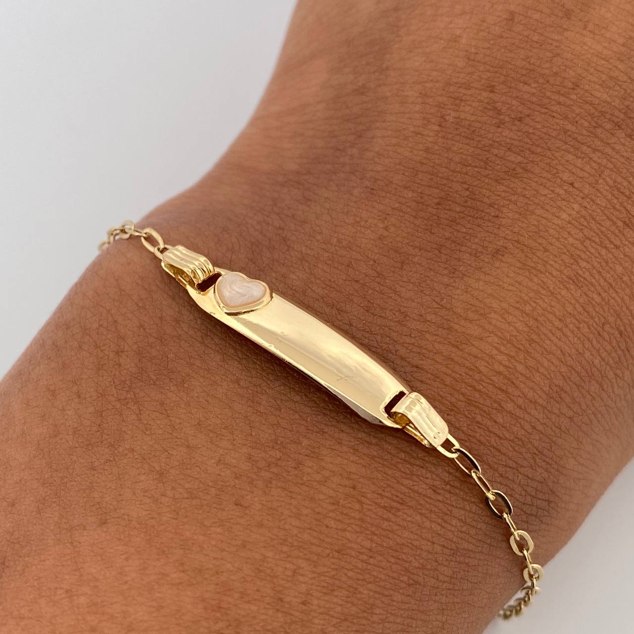 Bracelet Baby Drawer Heart Iridescent 1.45gr / 13.1cm-14.5cm / 1.6mm Rectangular Curved Plate 18K Yellow Gold $