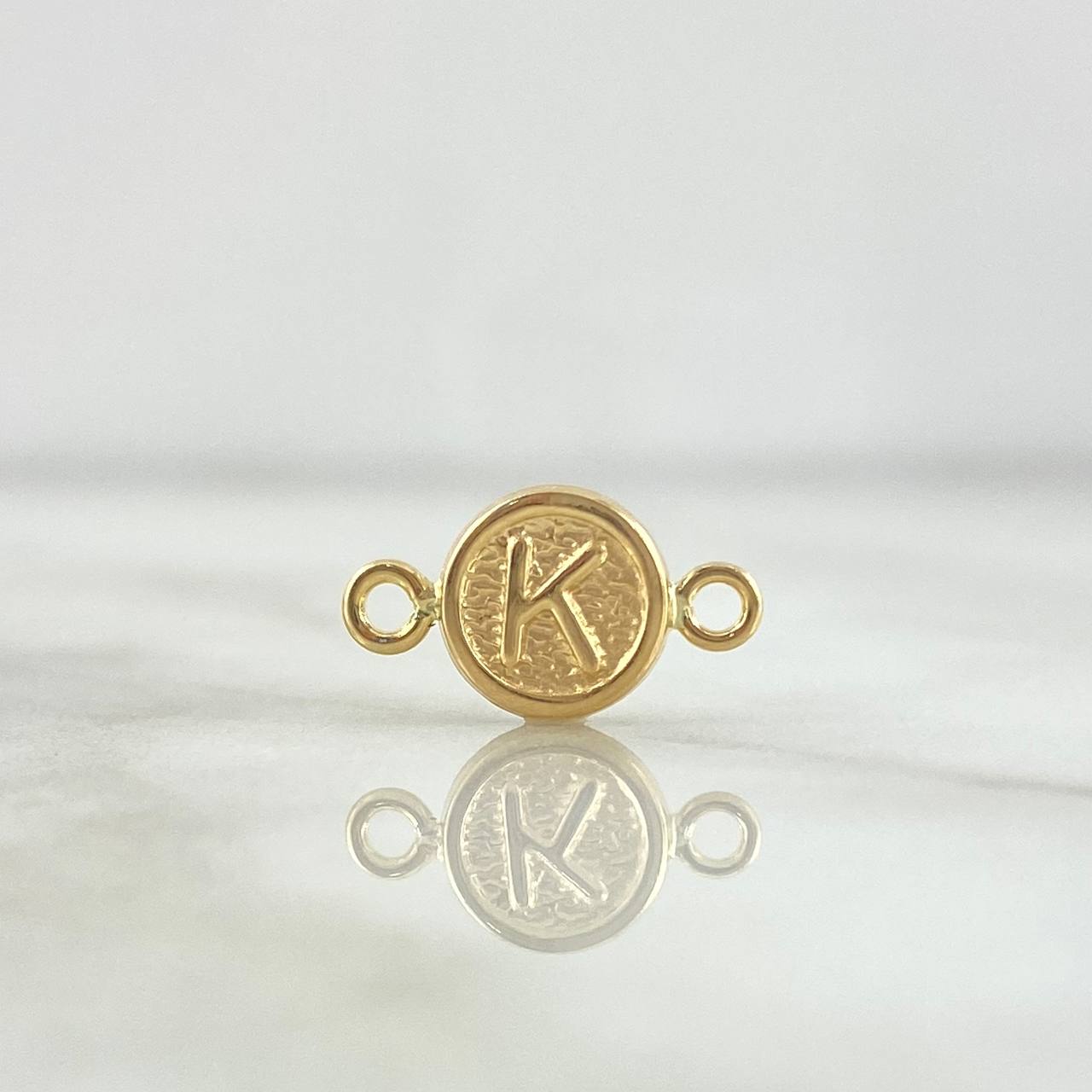 Herraje Letra K 0.35gr / 1.5cm / Circulo Texturizado Rustico Oro Amarillo 18K