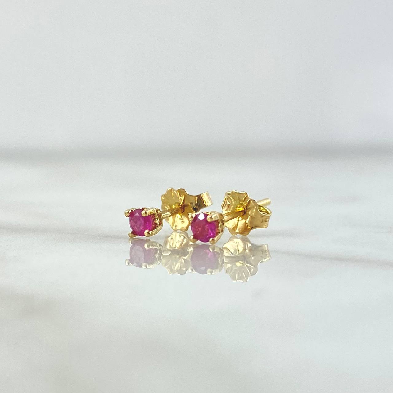 Topos Piedra 0.9gr / 4mm Rubi 35 Pts Oro Amarillo 18K (Joya) *