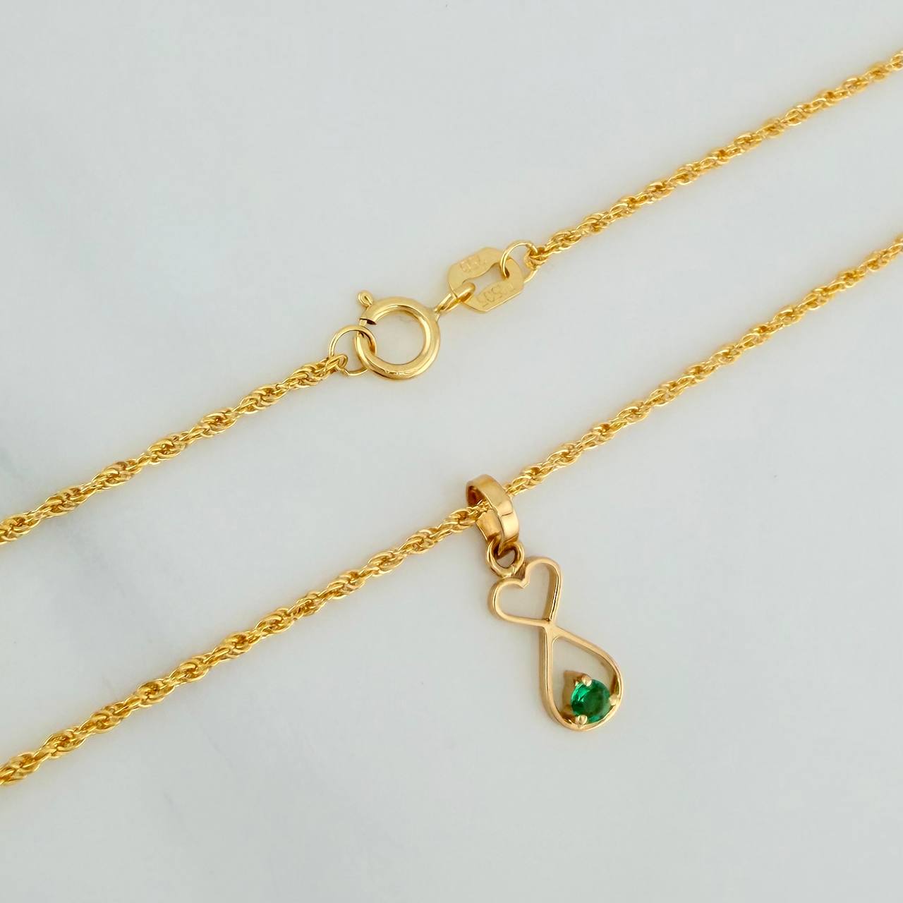 Set Bow+Fish Silhouette Rough Emerald 1.25g / 19 3/4 in / 1.2mm 18K Yellow Gold &