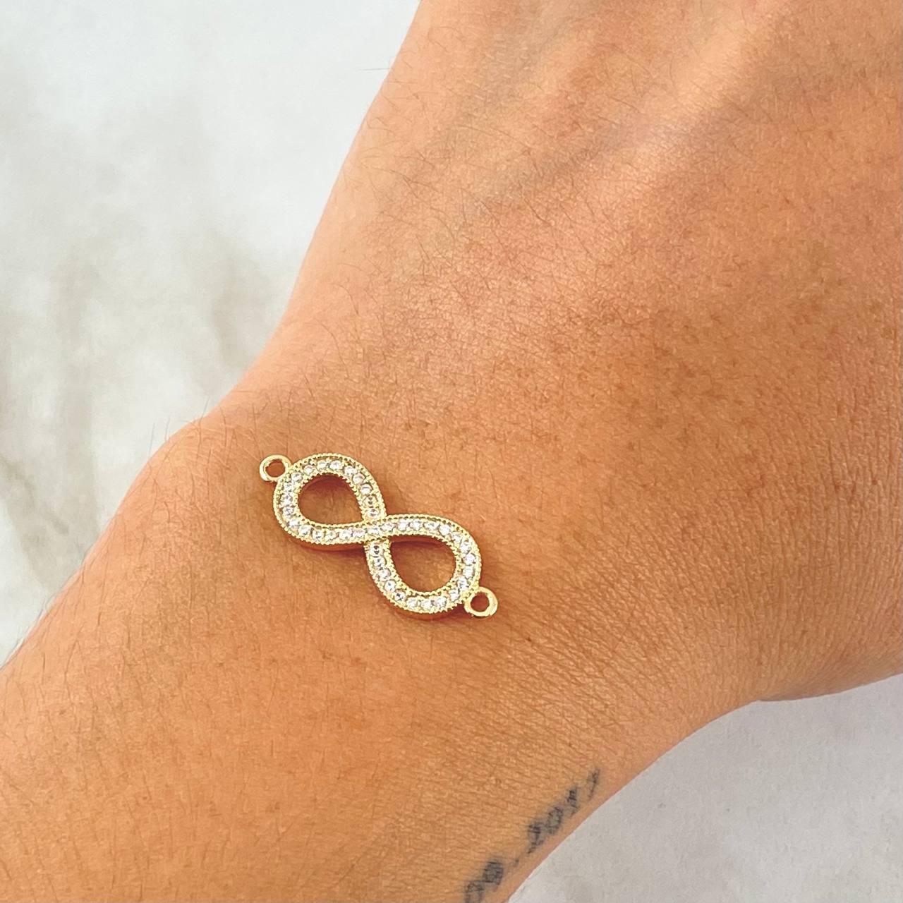 Charm 1.4gr / 2.5cm / 18K Gold ©