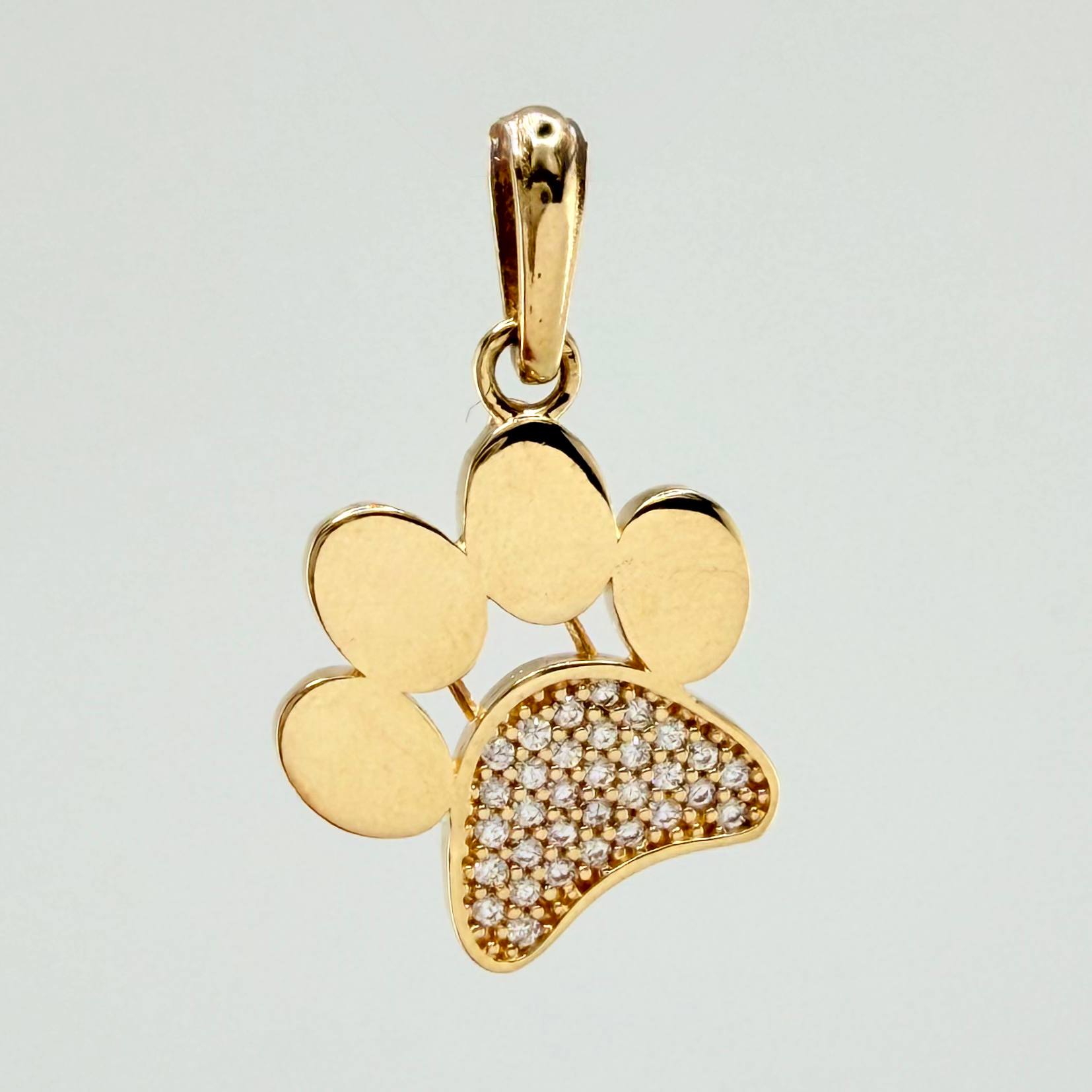 Dije Huella 2gr / 1 in / Oro Amarillo 18K ©