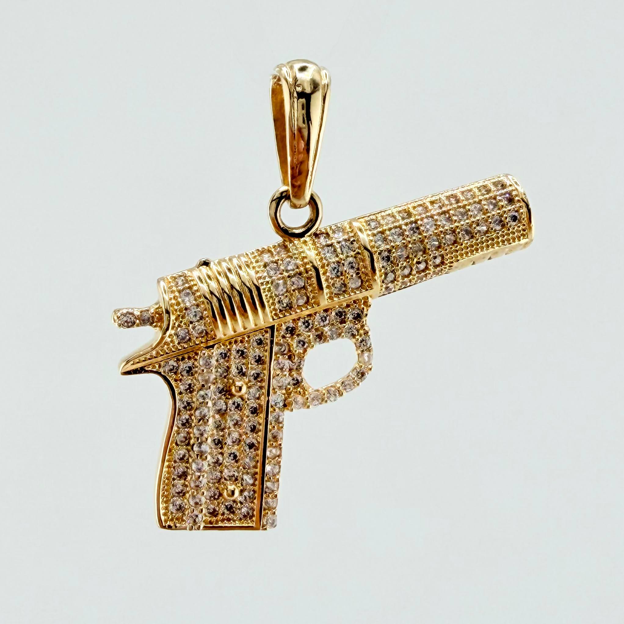 Dije Pistola 4.7gr / 1 1/4 in / Oro Amarillo 18K ©