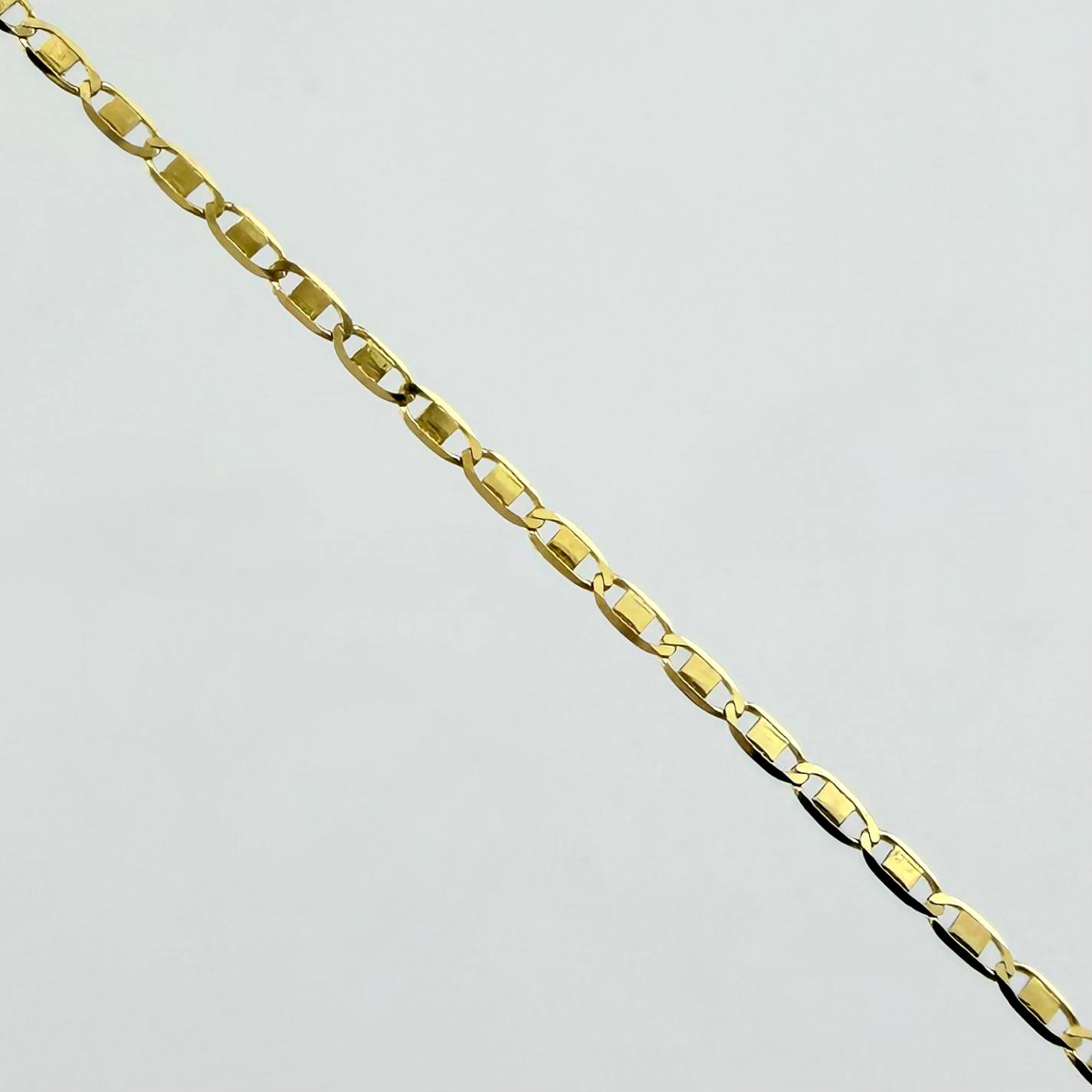 Cadena Plana 1.35gr / 15 3/4 in / 1.3mm Oro Amarillo +3 18K