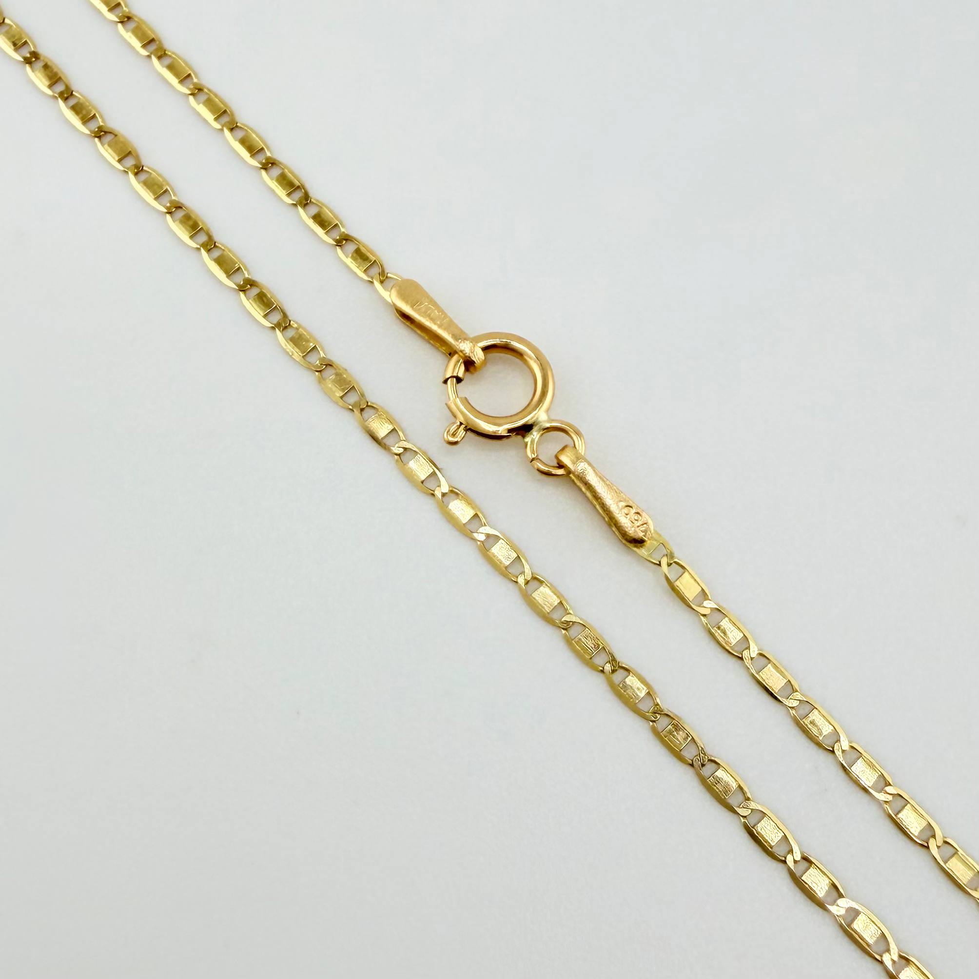 Cadena Plana 1.4gr / 15 3/4 in / 1.3mm Oro Amarillo +3 18K