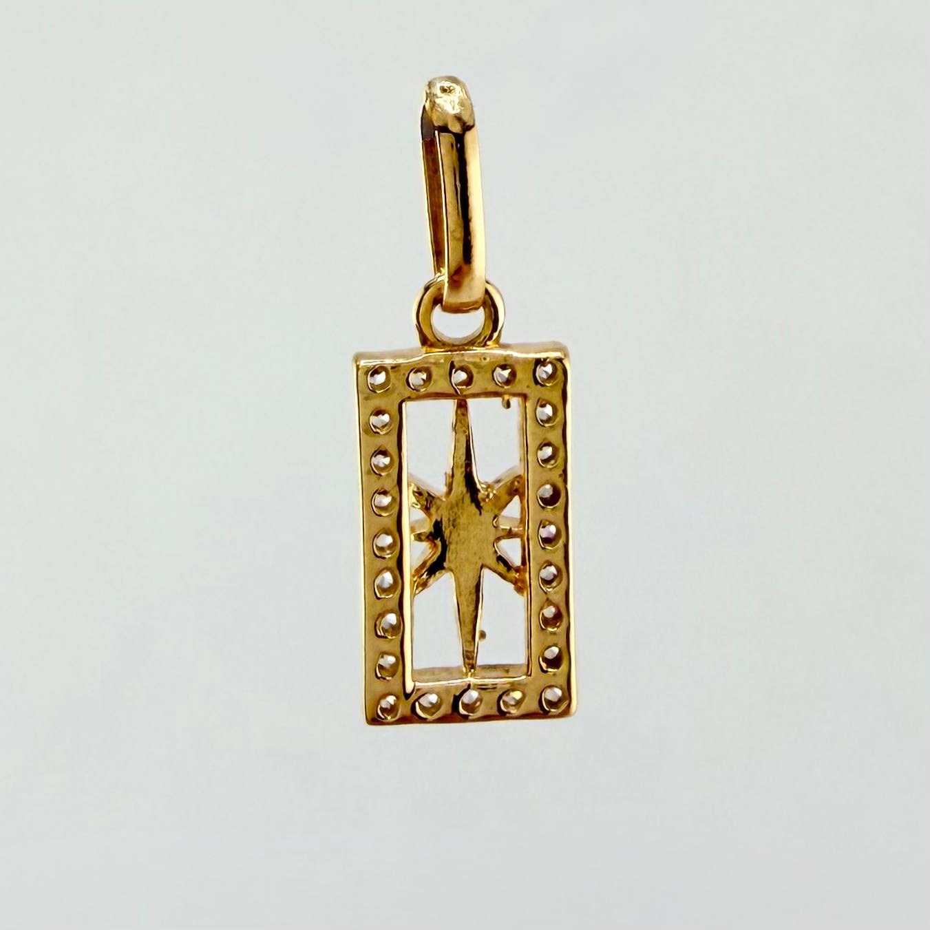 Dije Estrella Cardinal 1.05gr / 3/4 in / Oro Amarillo 18K