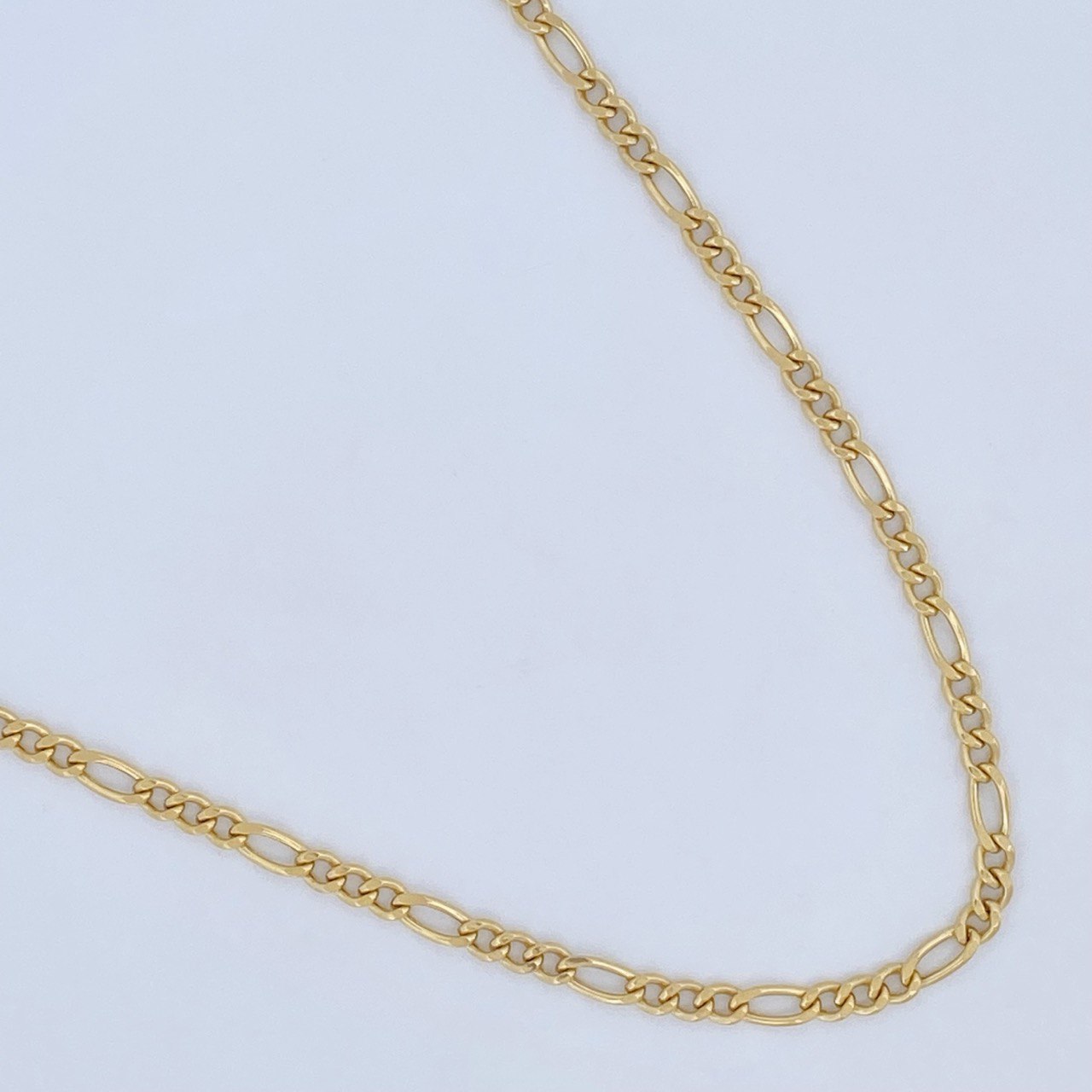 Cadena Figaro 6.15gr / 21 3/4 in / Oro Amarillo +1 18K $