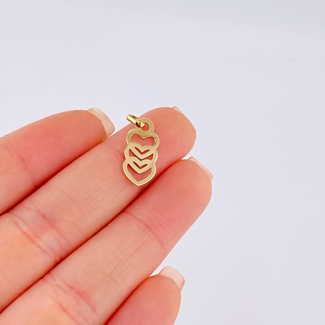 Dije Trio Corazones Silueta 0.5 g / 3/4 in Oro Amarillo 18K