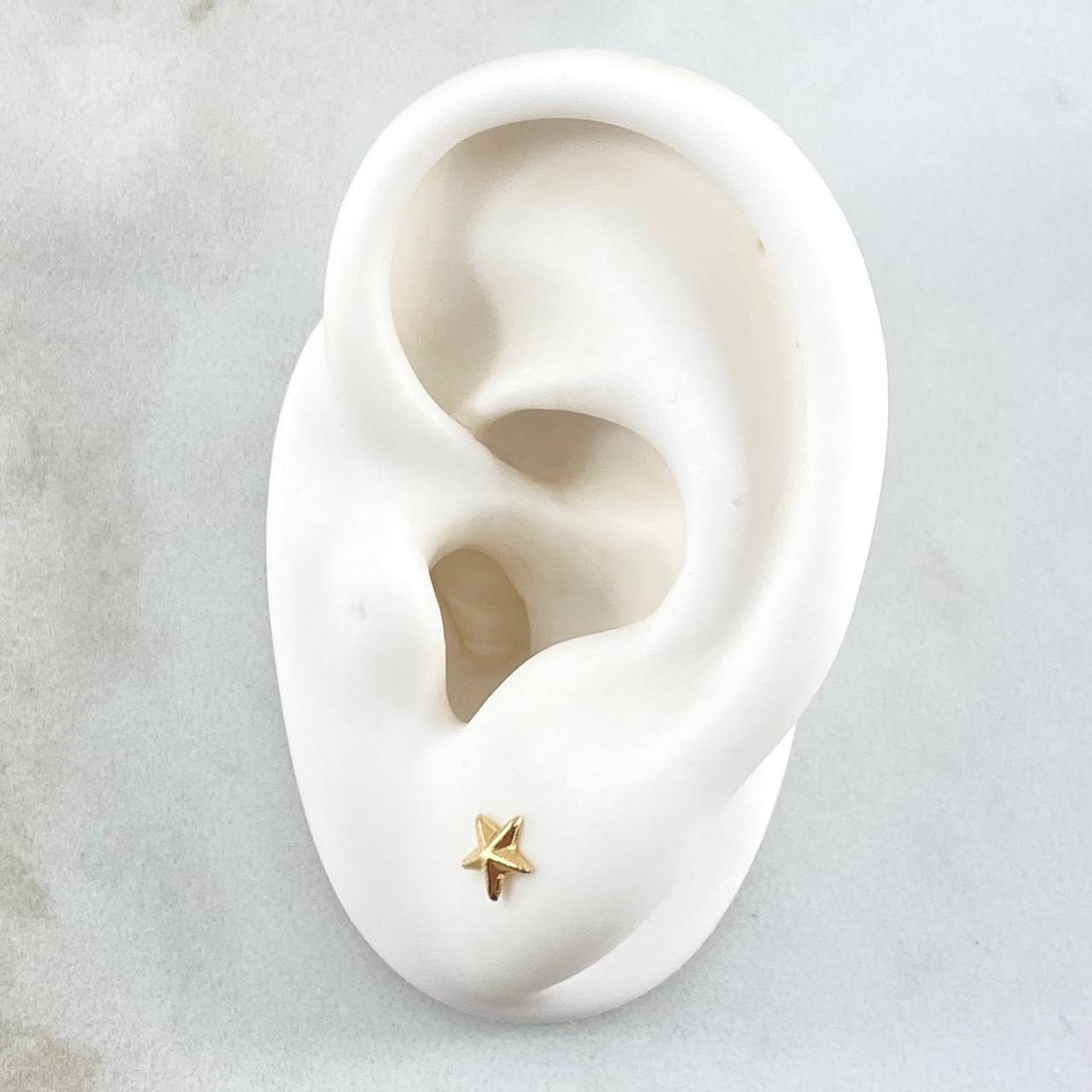 Topos Estrella de Mar 0.45gr / 5.5mm Rayadas Oro Amarillo 18K