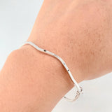 Pulso Aro Liso Ondulado 2.85gr / 7 in / 2mm Oro Blanco +4 18K ©