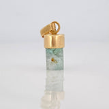 Dije Morralla Esmeralda 0.4g / 1/2 in Oro Amarillo 18K
