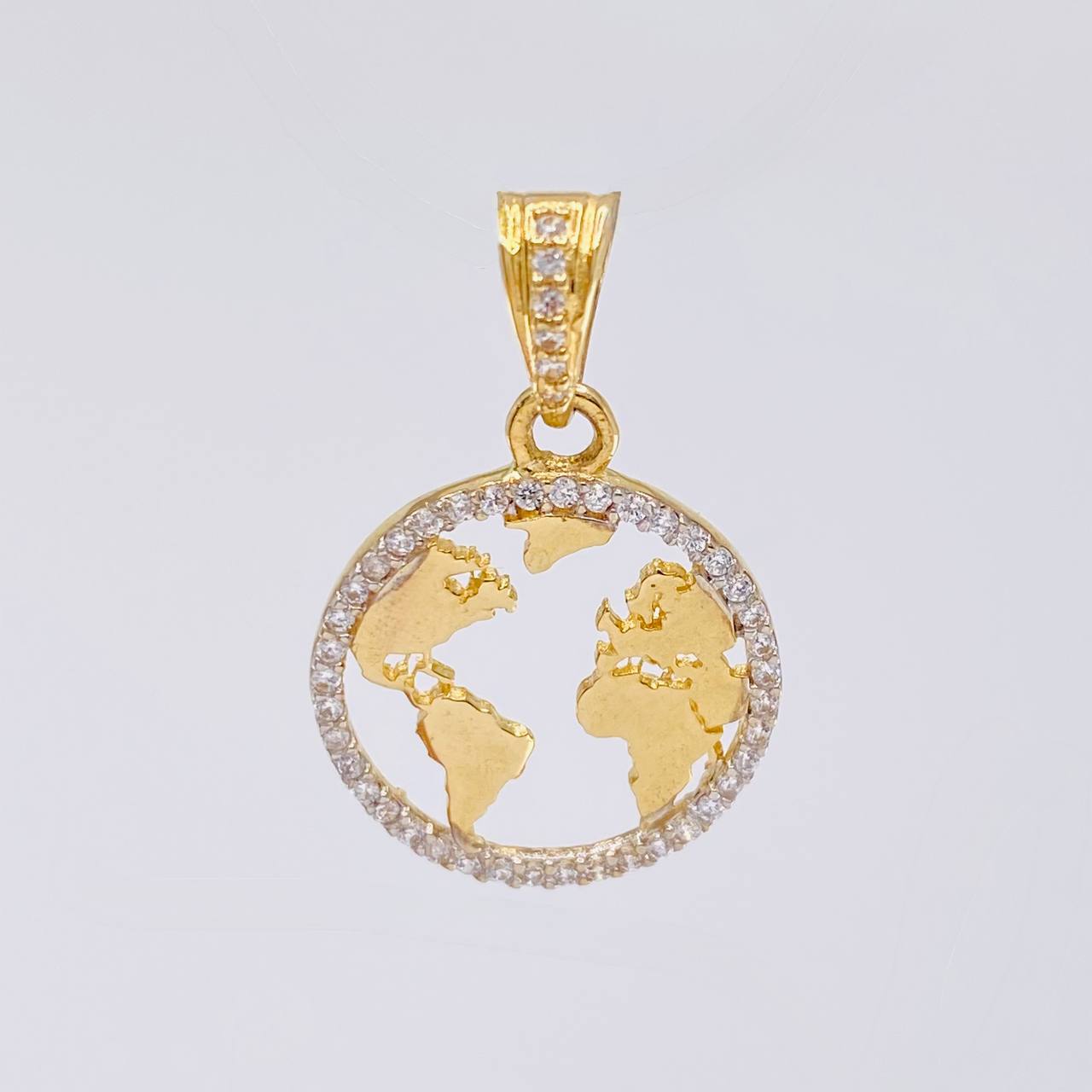 Dije Silueta Tierra 2 g / 1 in Oro Amarillo 18K