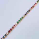 Bracelet Tennis 8.5gr / 17.7cm / 3.5mm Emerald 70 Pts Sapphires Rubies 1.95 Qts Diamond 50 Pts 18K Yellow Gold (Jewel) &