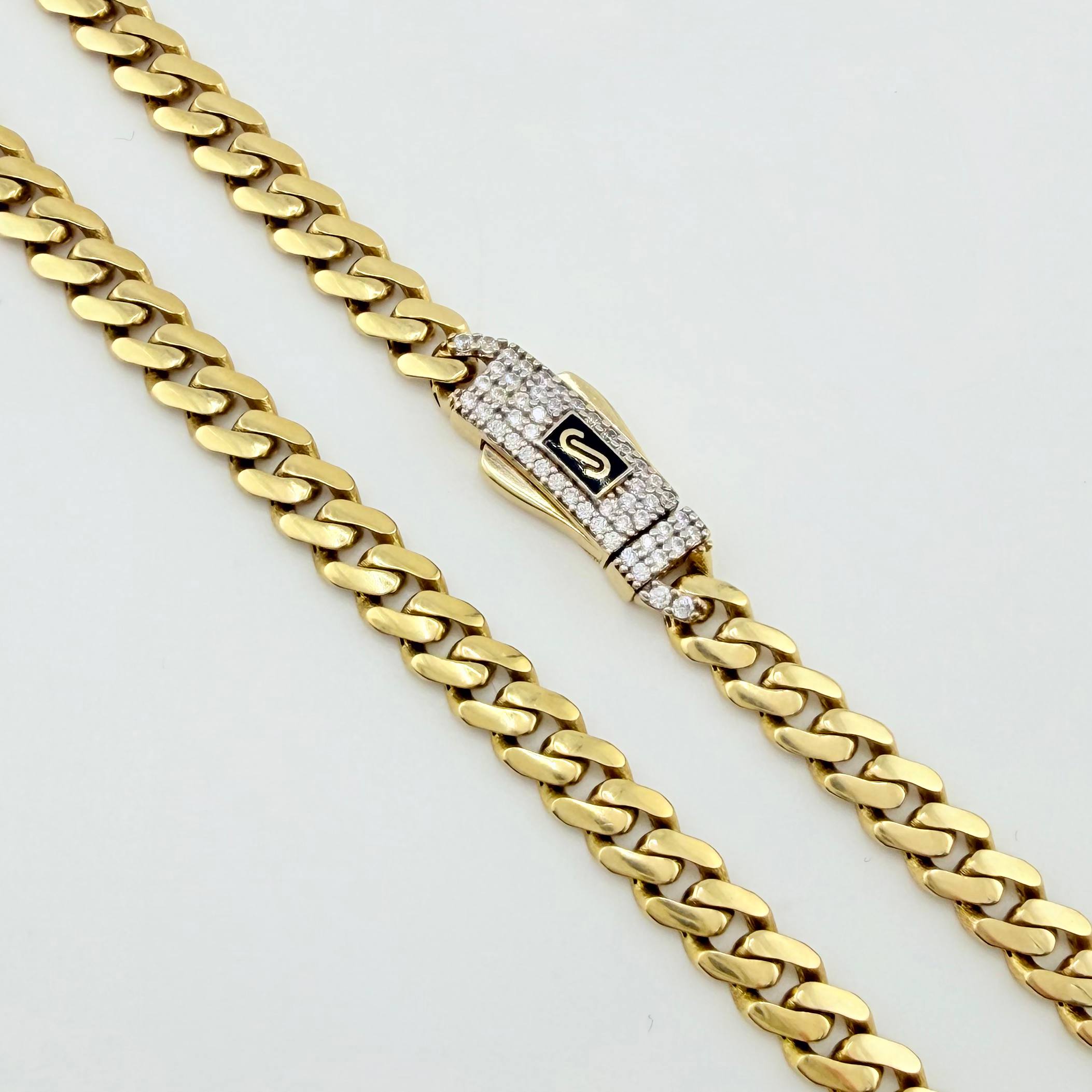 Cadena Cubana Infinito 19.2gr / 23 1/2 in / 4.9mm Oro Amarillo +4 18K
