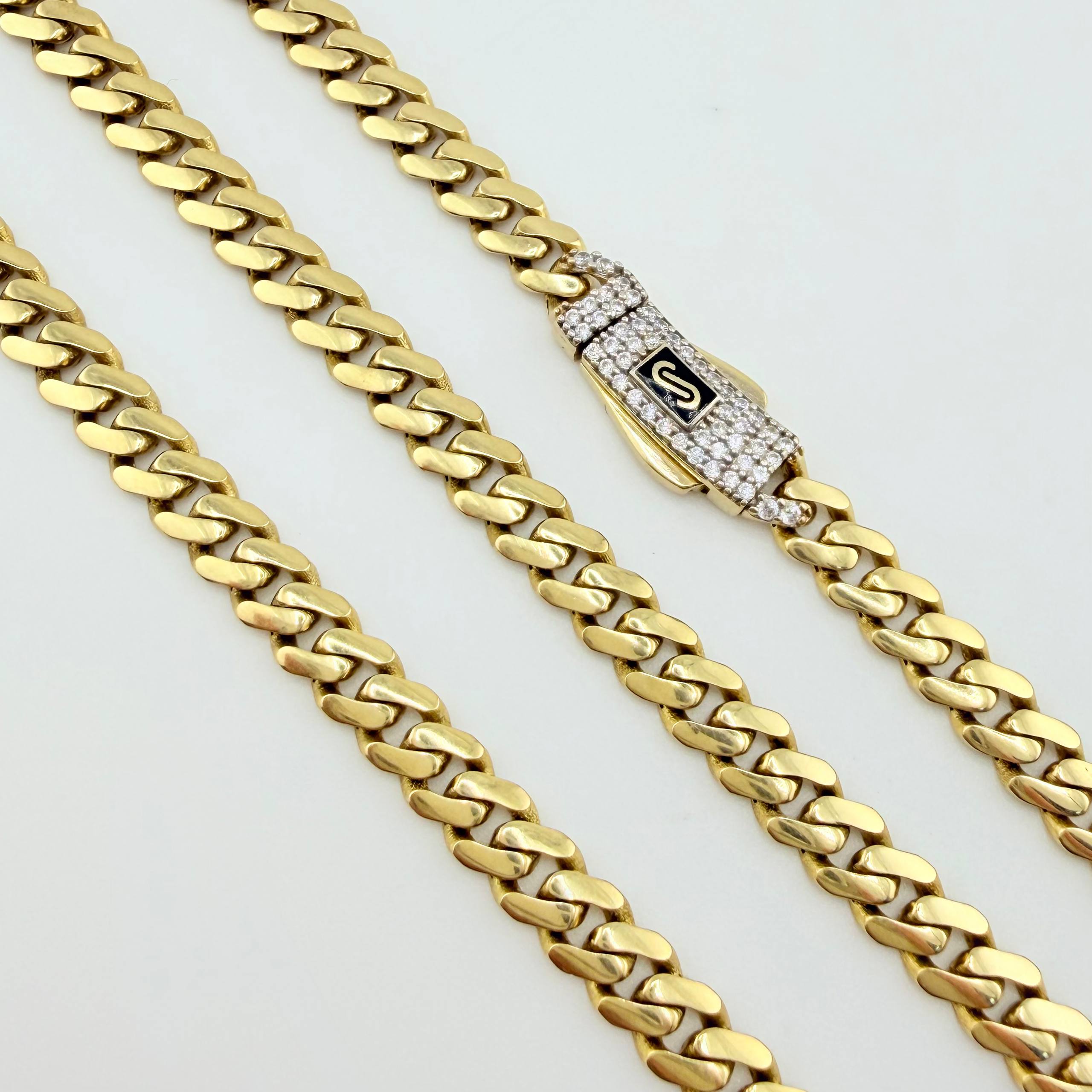 Cadena Cubana Infinito 19.2gr / 23 1/2 in / 4.9mm Oro Amarillo +4 18K