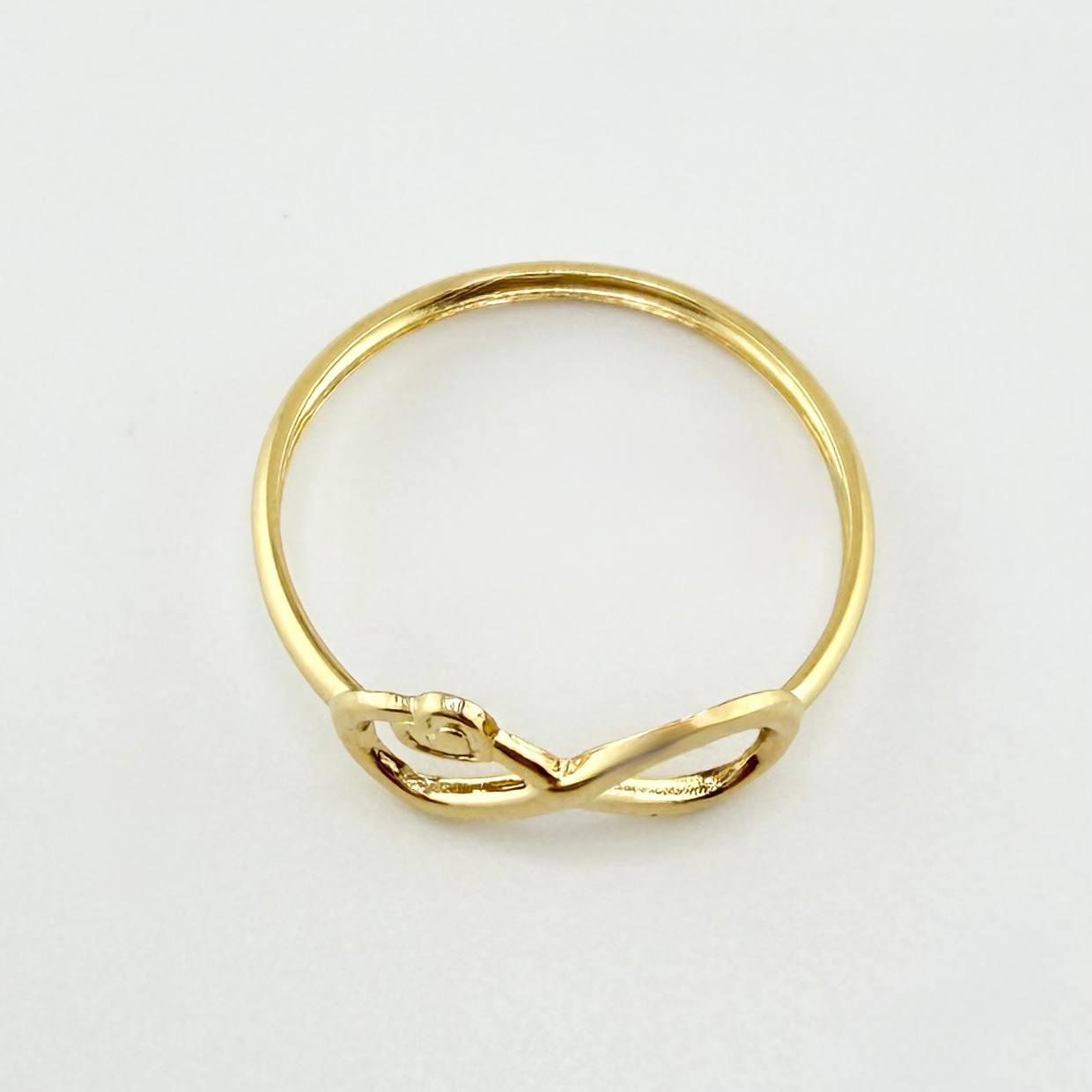 Anillo Infinito Corazón 0.6gr / T7 / Oro Amarillo 18K