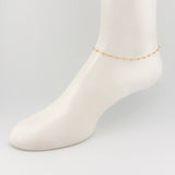 Tobillera Aro Seguido Dije Estrella 2.45gr / 9 3/4 in / 2.3mm Dos Oros Amarillo Blanco +4 18K