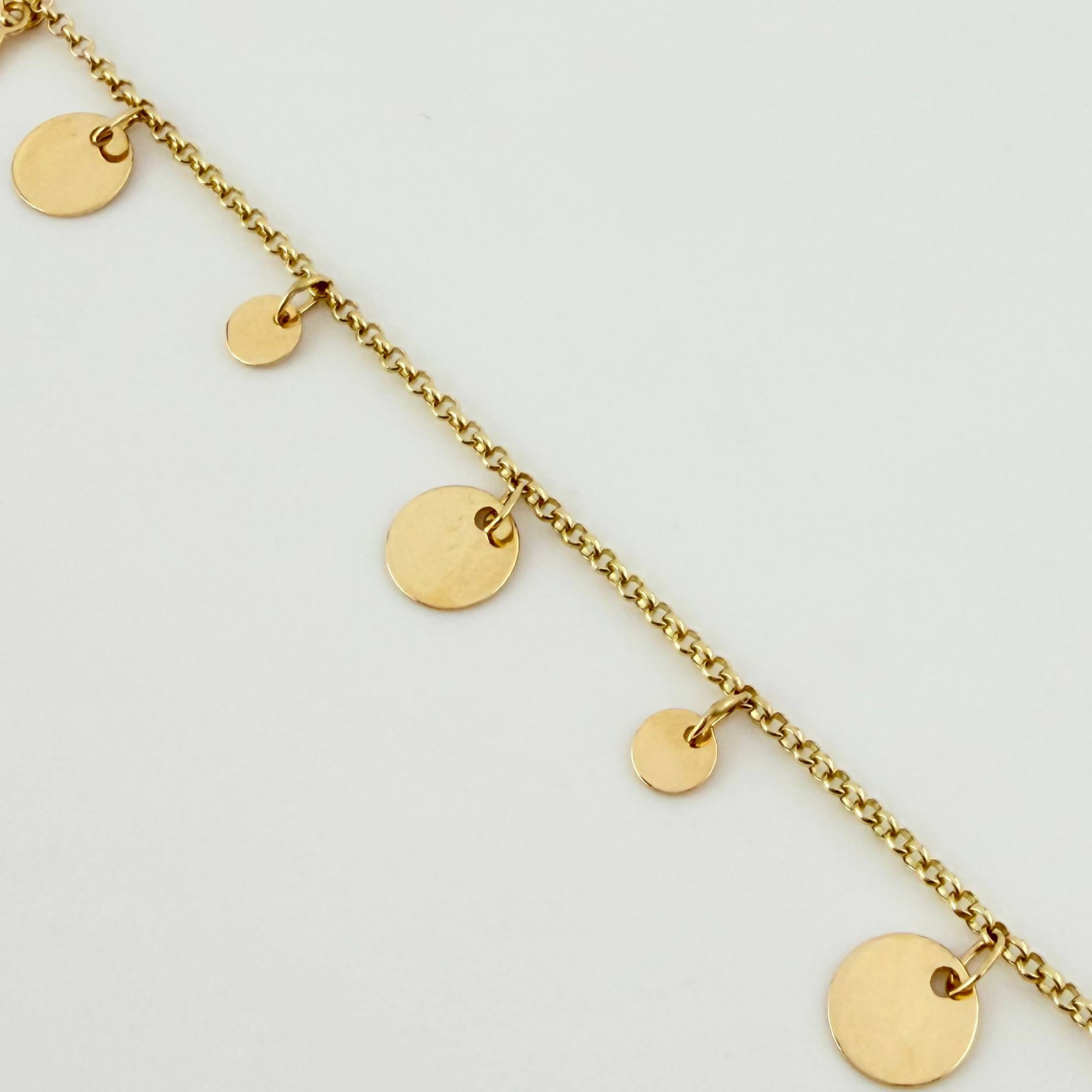 Pulso Roll On Placas Circulares 2.75gr / 7 1/4 in / 1.5mm Oro Amarillo +4 18K