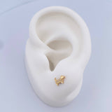 Topos Perro 0.7gr / Circones Blancos Oro Amarillo 18K $