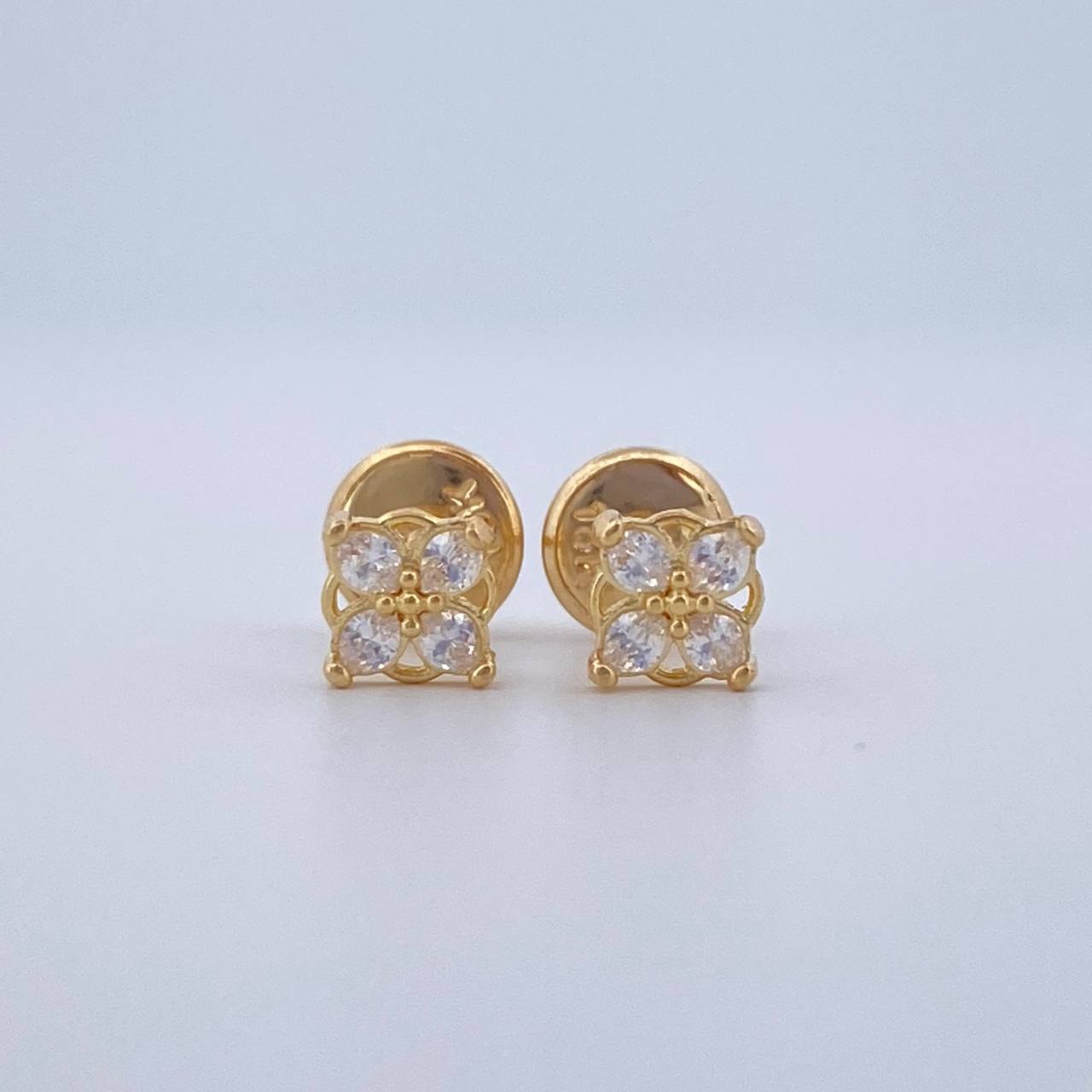 Topos Flor 0.65gr / Oro 18K &