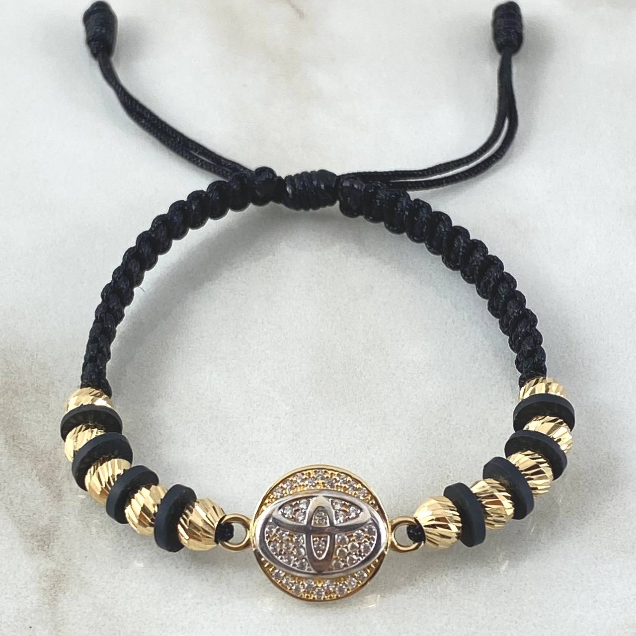 Pulsera Negra Herraje Marca Automovil 4.9gr / Oro 18K
