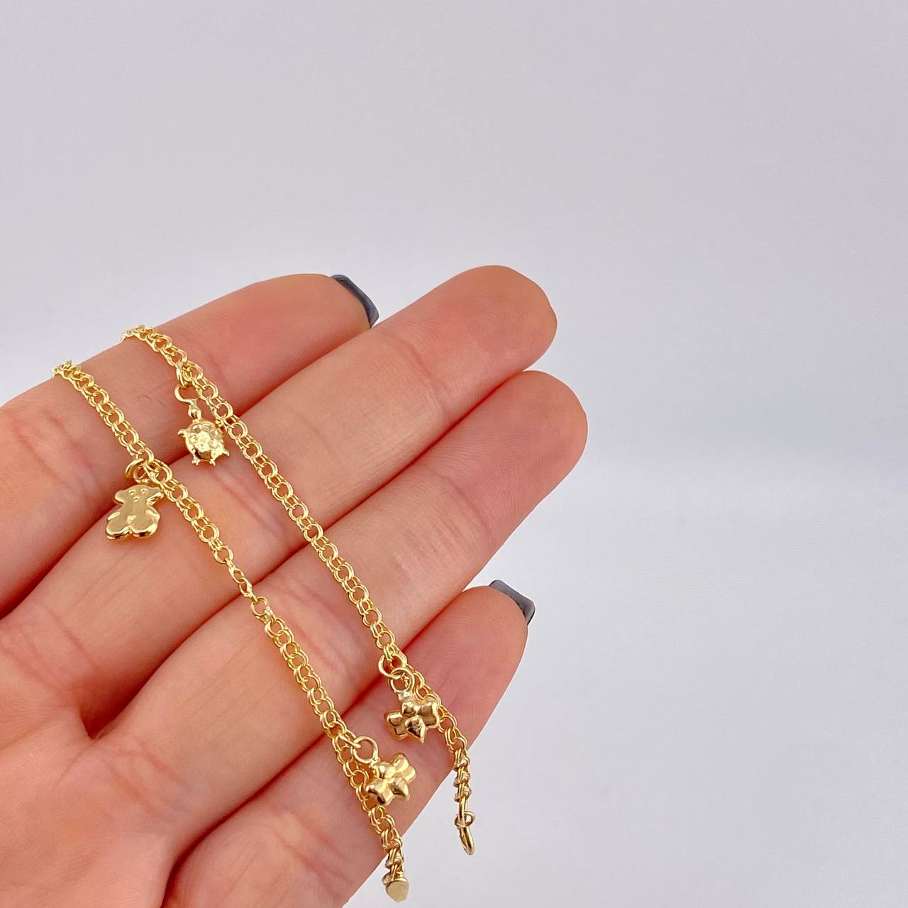Tobillera Roll On Dijes 3.6 g / 9 3/4 in / 2.3 mm Oro Amarillo 18K