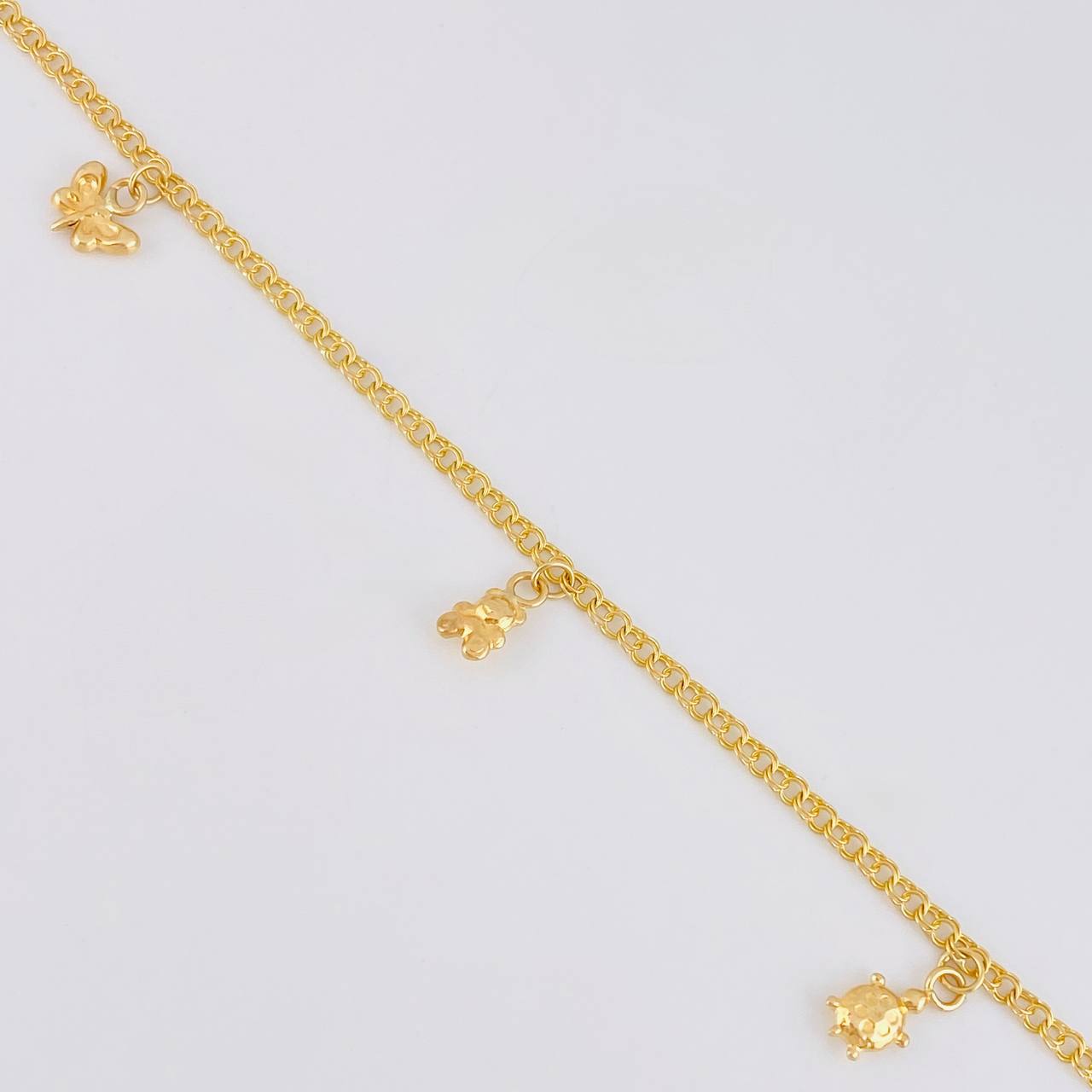 Tobillera Roll On Dijes 3.65 g / 10 1/2 in / 2.3 mm Oro Amarillo 18K