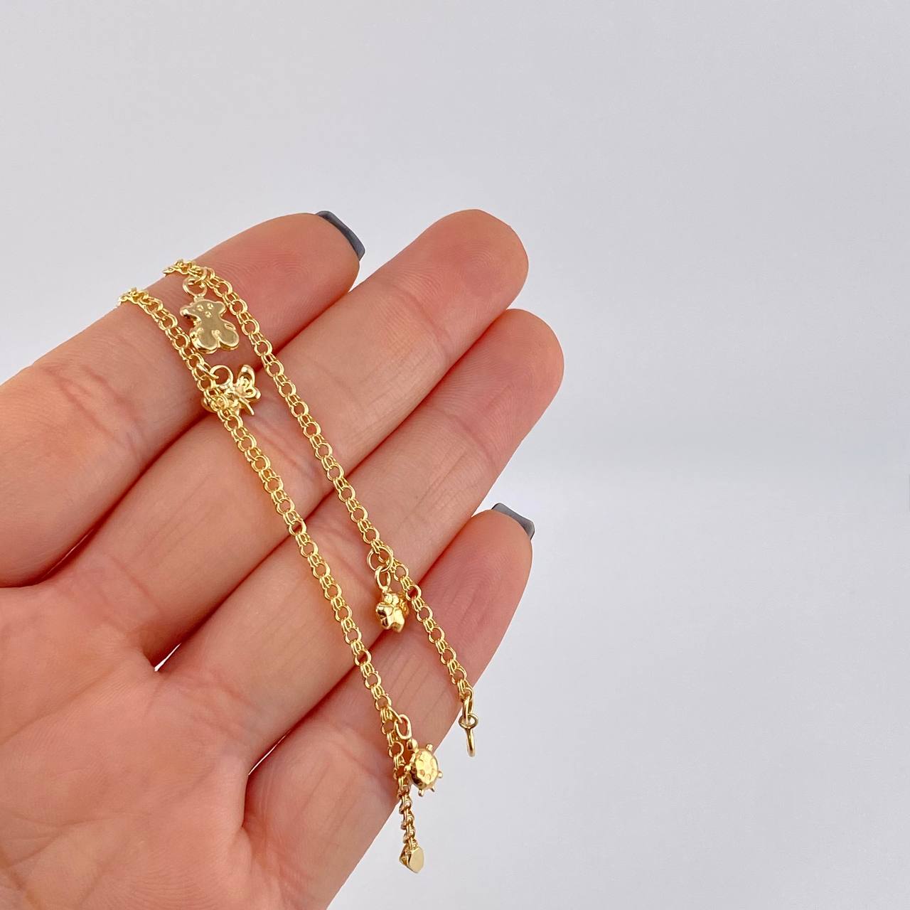 Tobillera Roll On Dijes 3.65 g / 10 1/2 in / 2.3 mm Oro Amarillo 18K
