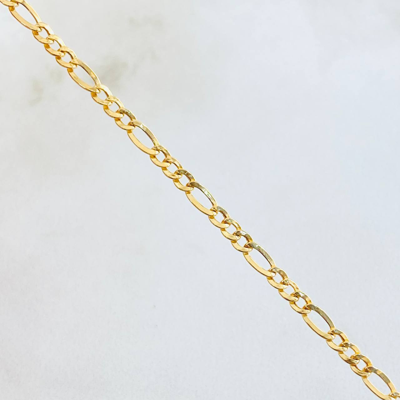 Figaro Chain 2.25gr / 19 3/4 in / 18K Gold +1 ©