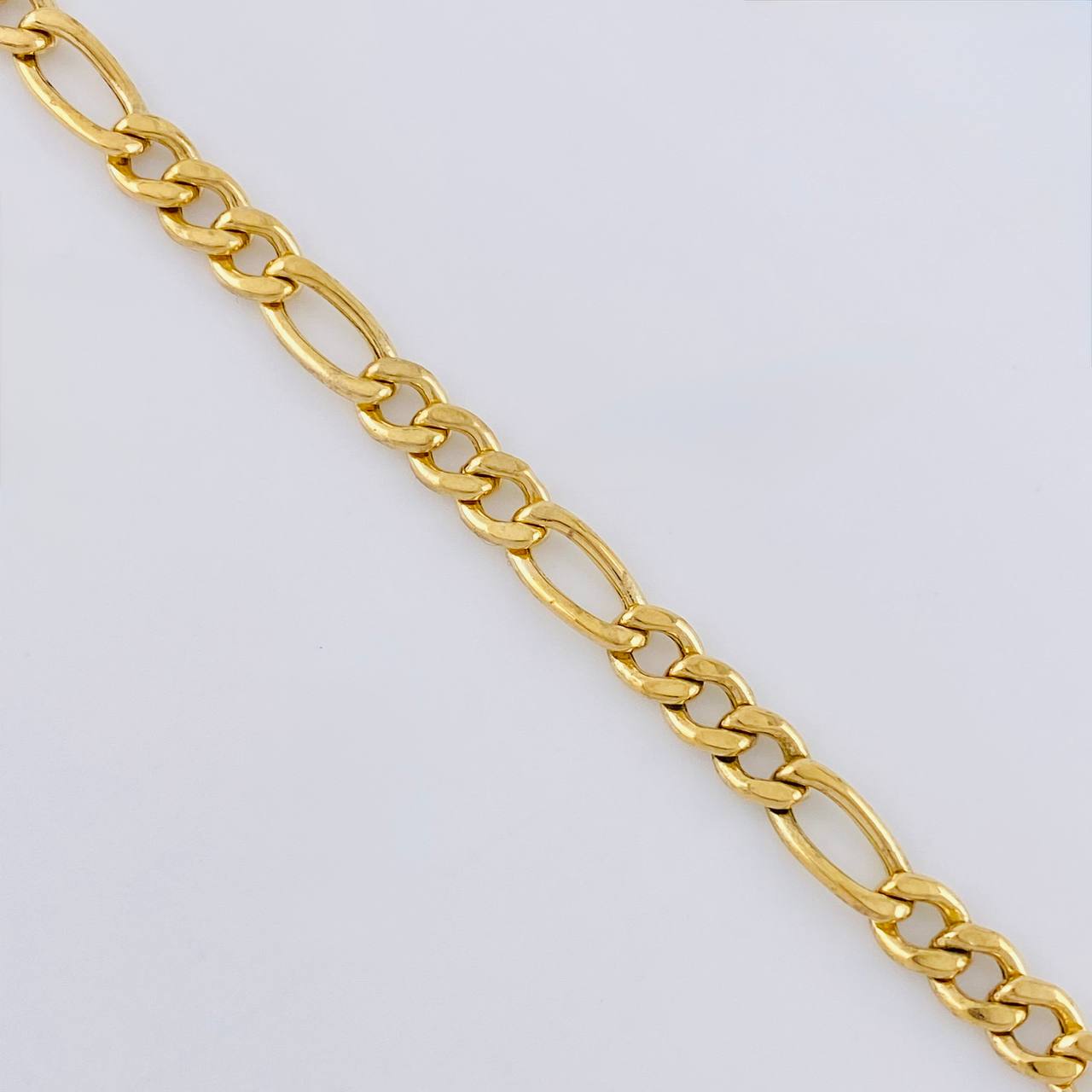 Cadena Figaro 14.35 g / 25 in / 4.6 mm Oro Amarillo 18K
