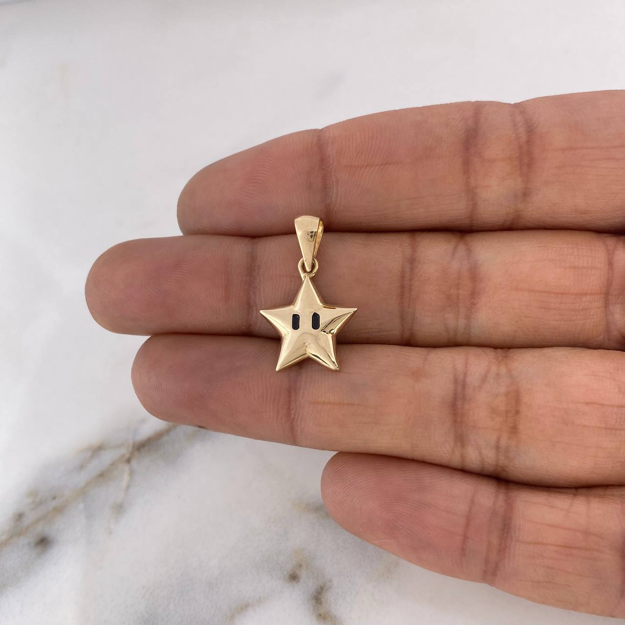 Pendant Star 1.3gr / 2.1cm / 18K Yellow Gold #