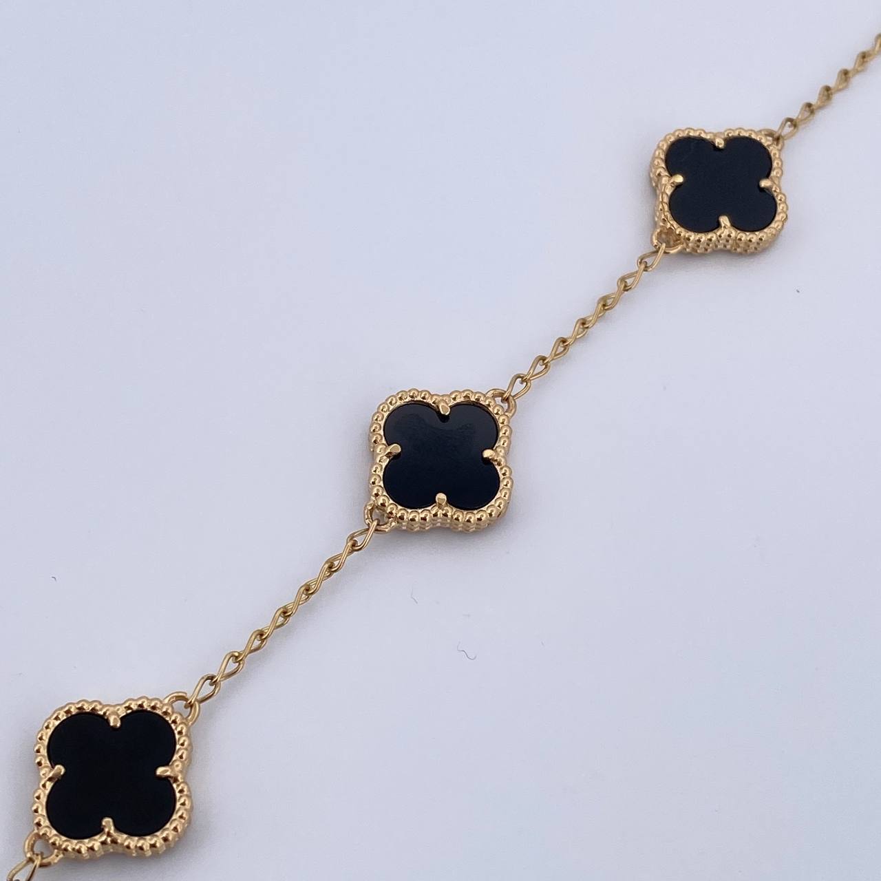 Pulso Espiga Trebol Gradual 8.25gr / 17.5cm-18.6cm / 1.4mm Onix Negro Oro Amarillo 18K $