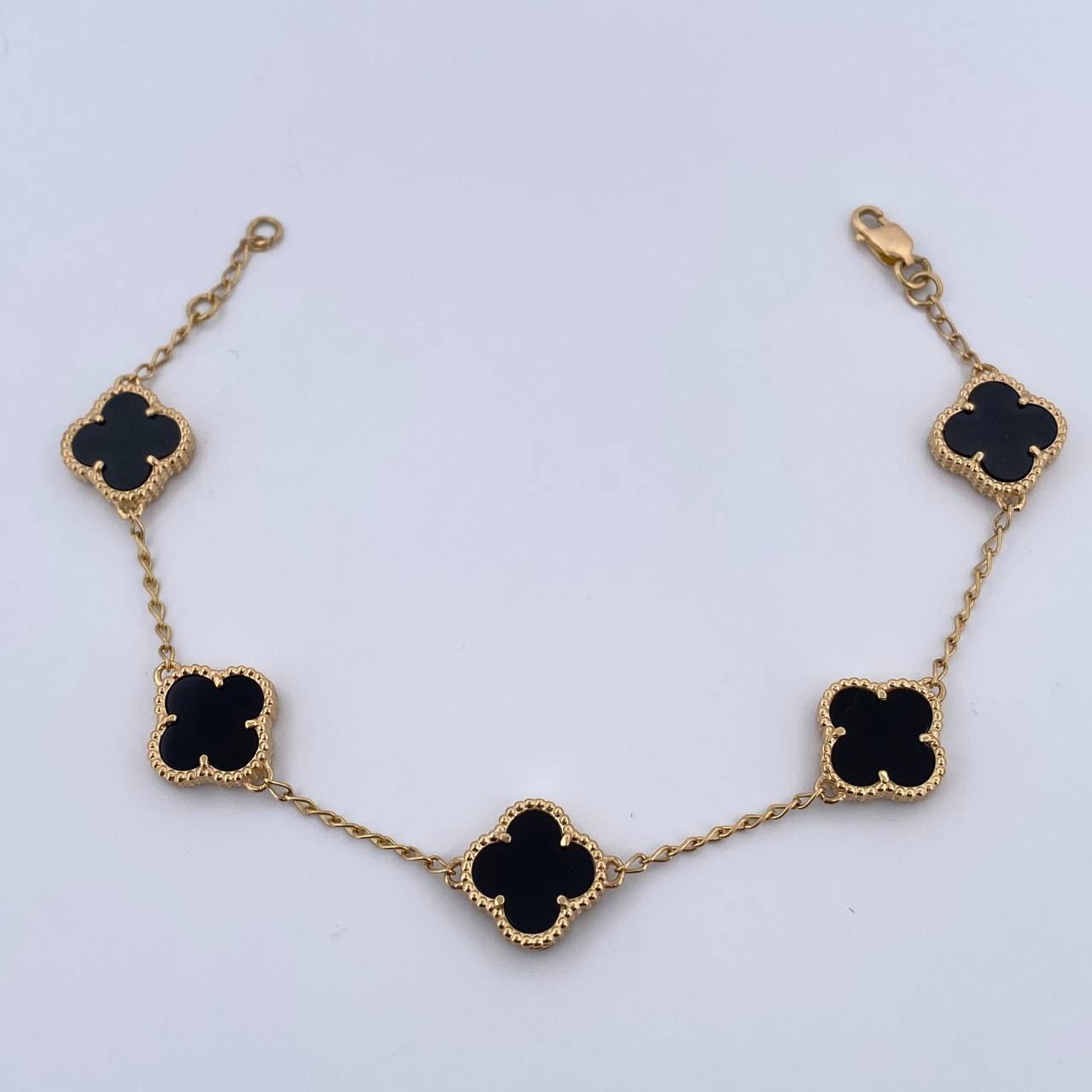 Pulso Espiga Trebol Gradual 8.25gr / 17.5cm-18.6cm / 1.4mm Onix Negro Oro Amarillo 18K $