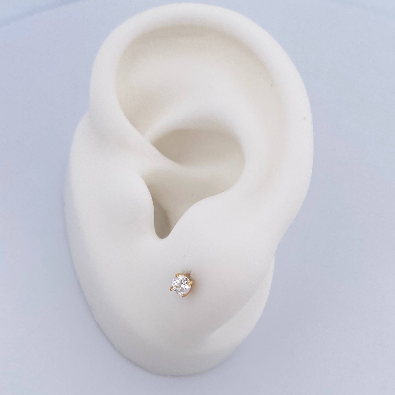 Topos Cuatro Garras 0.55gr / Circon Blanco Oro Amarillo 18K $