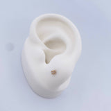 Topos Cuatro Garras 0.4gr / Circon Blanco Oro Amarillo 18K $
