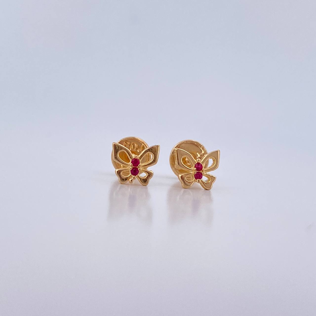 Topos Mariposa 0.6gr / Circon Fucsia Oro Amarillo 18K $