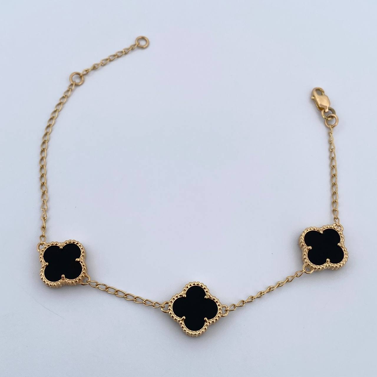 Pulso Espiga Trebol Gradual 5.5gr / 16.8cm-19.1cm / 1.6mm Onix Negro Oro Amarillo 18K $
