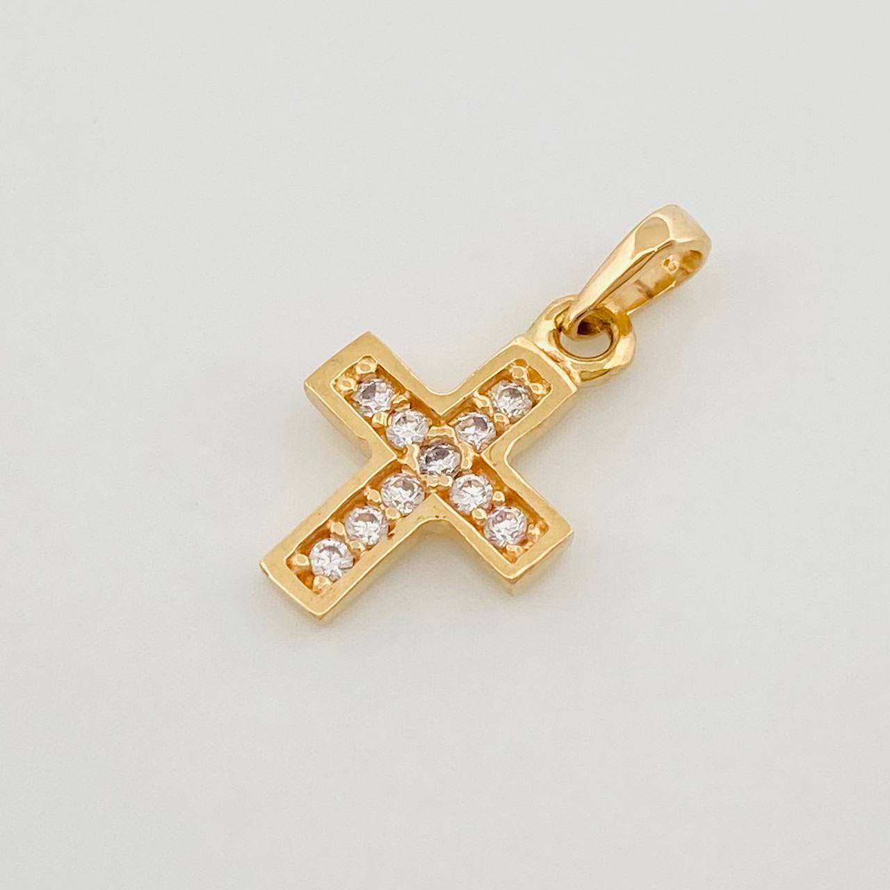 Dije Cruz 0.7 g / 1/2 in Oro Amarillo 18K