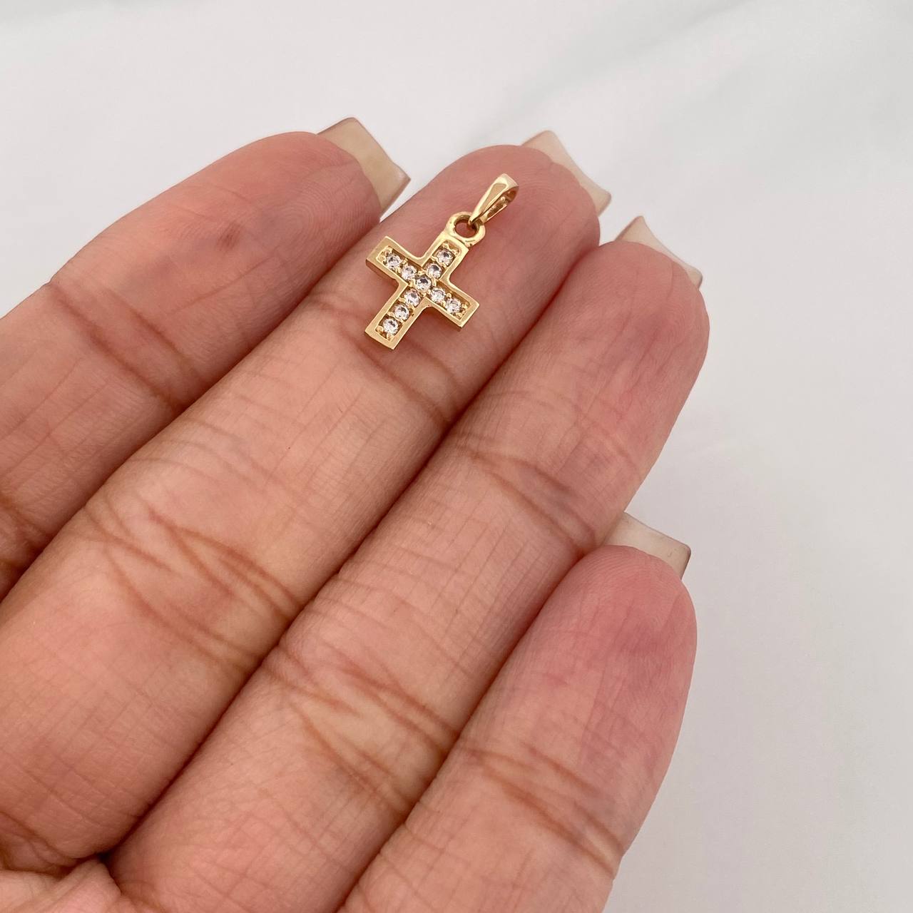 Dije Cruz 0.7 g / 1/2 in Oro Amarillo 18K