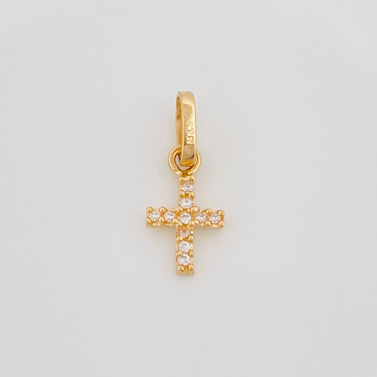 Dije Cruz 0.45 g / 1/2 in Oro Amarillo 18K