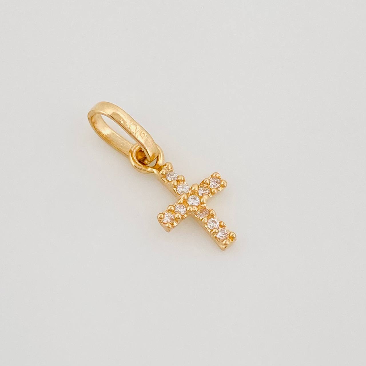 Dije Cruz 0.45 g / 1/2 in Oro Amarillo 18K