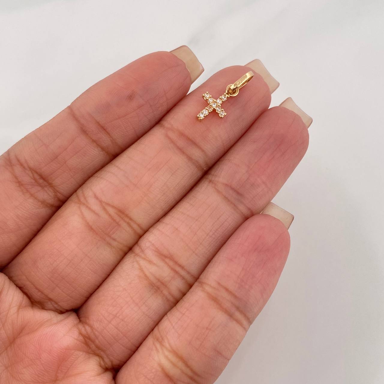 Dije Cruz 0.45 g / 1/2 in Oro Amarillo 18K
