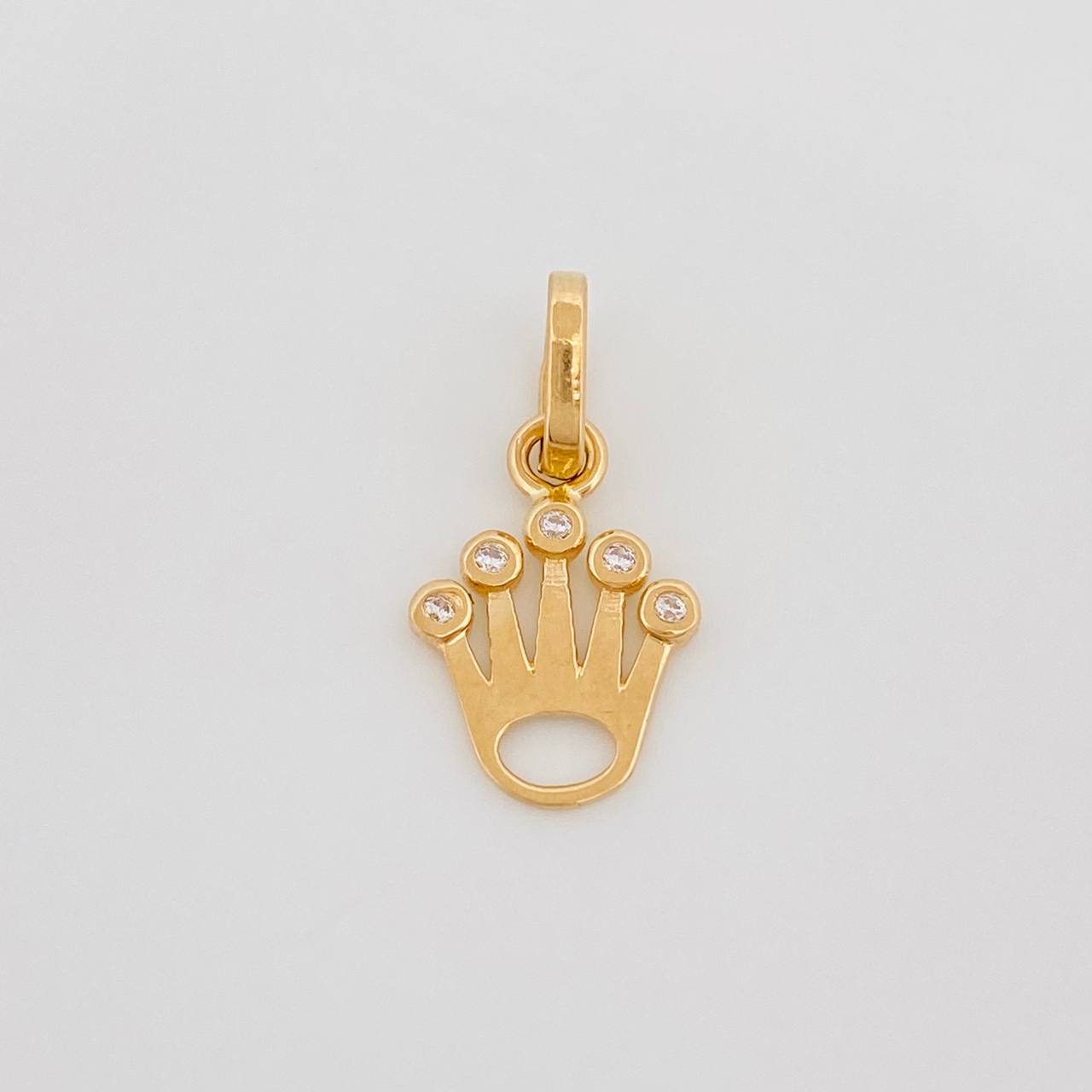 Dije Corona 0.6 g / 3/4 in Oro Amarillo 18K